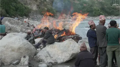 BBC/Shreejana Shrestha Bodies cremated by the river in Nepal after earthquake