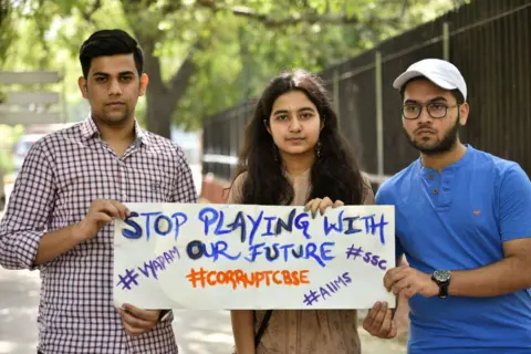 Hindustan Times via Getty Images Students protest against a school exam paper leak in Delhi in 2018