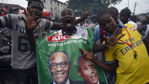 AFP Supporters of Nigeria's Muhammadu Buhari celebrate his election in March 2015