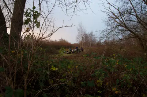 BBC Ringing group sitting at a temporary tagging station near Ripley in Surrey