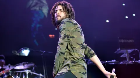 Getty Images J Cole on stage