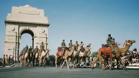 Getty Images A military parade past India Gate on on Republic Day