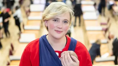 Getty Images Stella Creasy with her child at an election count in December 2019