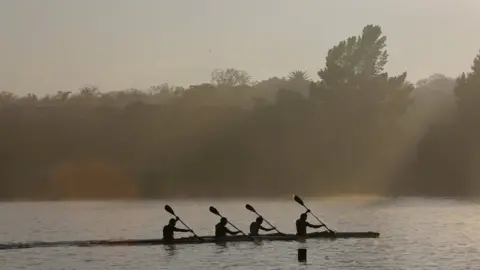 EPA Canoeists on Emmarencia Dam in central Johannesburg, South Africa - Tuesday 3 October 2017