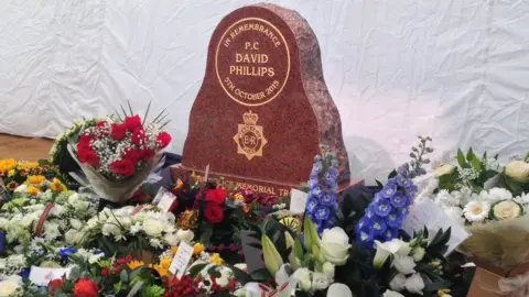 BBC The memorial to PC Dave Phillips