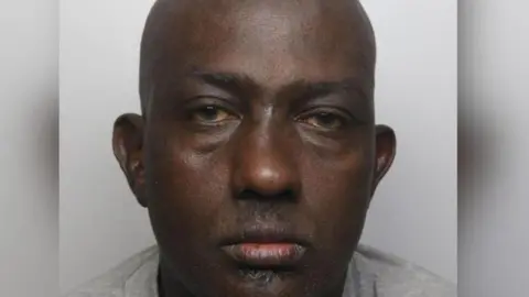 Derbyshire Police A mugshot of Haybe Cabdiraxmaan Nur