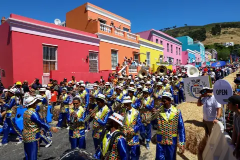 Reuters Cape Town"s minstrels provide entertainment at the start of the Red Bull Box CartÂ Race challenges in Bo Kaap, one of the iconic neighbourhoods in Cape Town, South Africa, November 6, 2022.