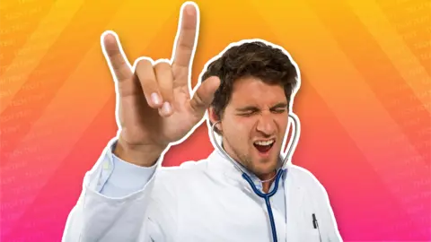 Getty Images A man wearing a white coat and wearing a doctor's stethoscope in his ears raises his hand in "devils horns" as if rocking out to music