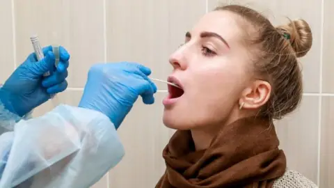 Getty Images Woman being tested