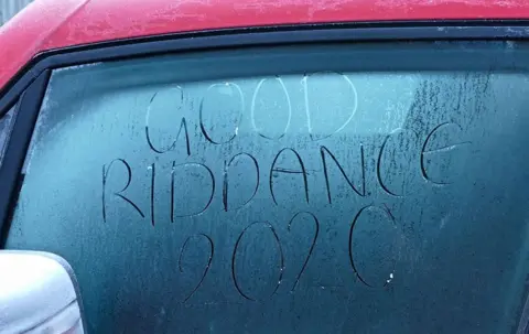 Geoff Swaine/REX/Shutterstock Good riddance 2020 written in frost on a car window Seasonal weather, Dunsden, Oxfordshire