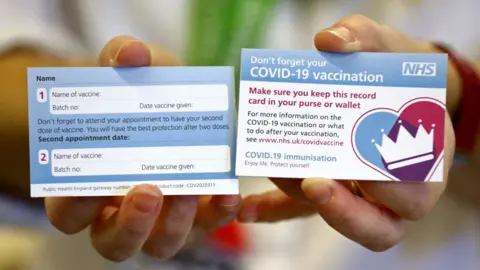 Getty Images Vaccine reminder card