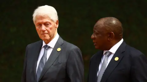 Getty Images Former US President Bill Clinton and current South African President Cyril Ramaphosa