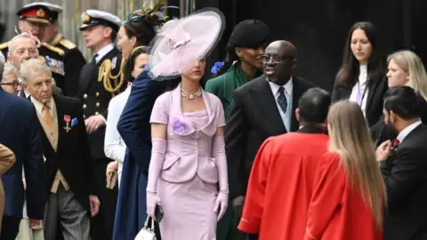 Getty Images Katy Perry and Edward Enninful