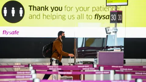 Getty Images Man at Edinburgh Airport
