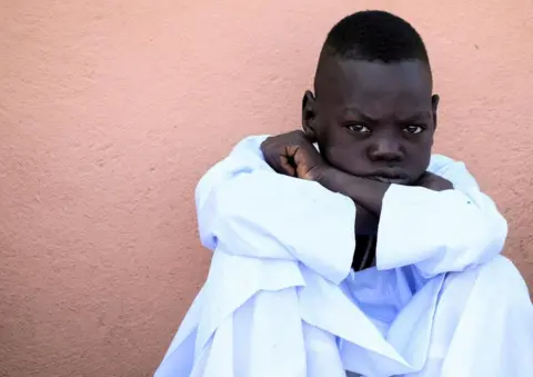 Ibrahim Mohammed Ishak/Reuters A boy from Darfur attends Eid al-Adha prayers in al-Qadarif, Sudan- Wednesday 28 June 2023