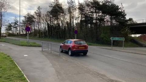 BBC Car entering slip-road onto A494 (have blurred the number plate)