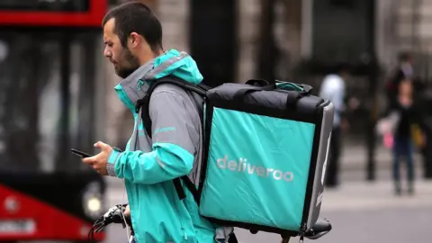 Dan Kitwood Deliveroo rider