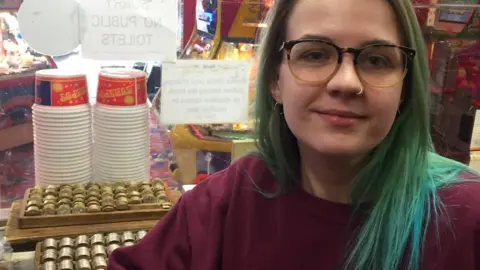 Amber Scraggs, amusement arcade employee
