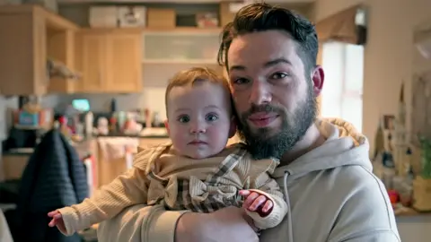 Sean and his nine-month-old daughter Isla