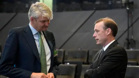 Getty Images UK National Security Advisor Sir Stephen Lovegrove pictured talking to his US counterpart, Jake Sullivan