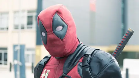 Kian Boyle/BBC Man from Luton dressed as the movie character Deadpool