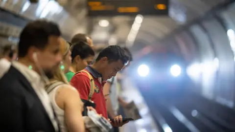 EPA Passengers on a platform