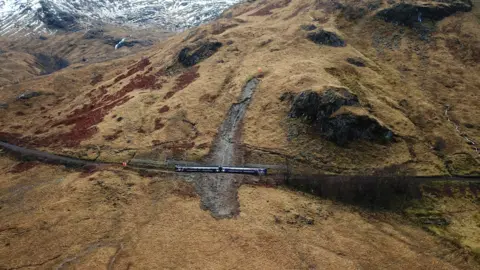 NetworkRail Scotland Image taken by a drone of train stuck in landslip