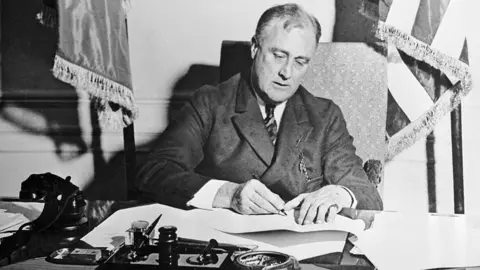 Getty Images FDR signs banking act