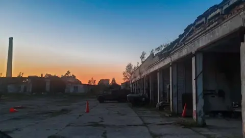 Sunset image of the abandoned garages