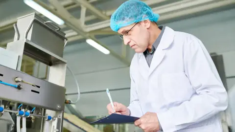 mediaphotos/Getty Images Food inspector