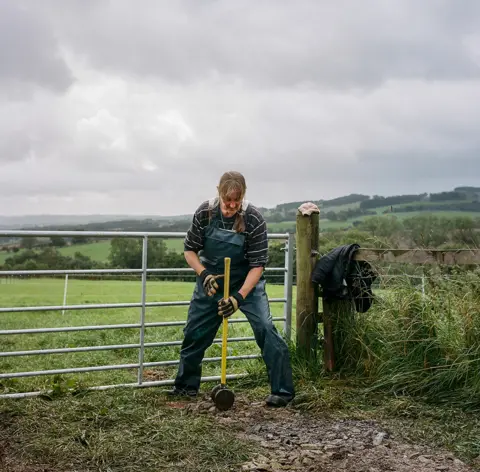 Joanne Coates Farmer Fransje works on her farm in Northumberland