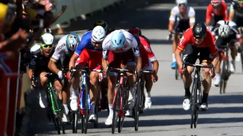 All SPORT/GETT IMAGES Mark Cavendish and other riders colliding