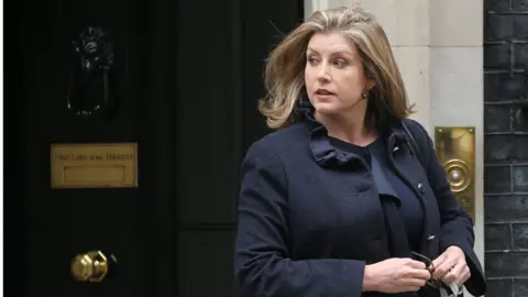 Getty Images Penny Mordaunt outside 10 Downing Street