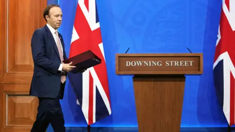 Getty Images Matt Hancock arrives to give an update on the Covid-19 pandemic, Downing Street, 27 May 2021