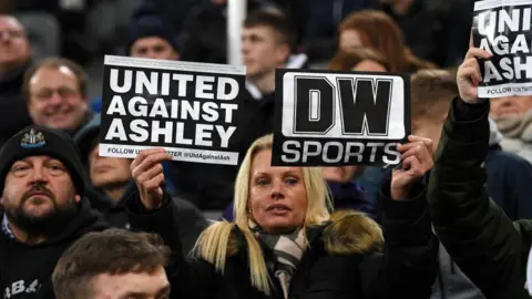 Getty Images Newcastle United fans protest against Mike Ashley