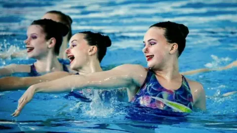 Gateshead Synchronised Swimming Club Synchronised swimmers in pool