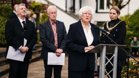 DOUGLAS COUNCIL/MATT MOSUR Relatives of victims and witnesses