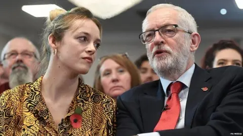 PA Media Jeremy Corbyn speaking to Labour's candidate in Harlow, Laura McAlpine