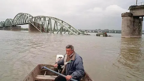 Getty Images A view of a bombed bridge in Belgrade in April 1999