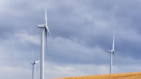 Getty Images Wind turbines