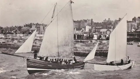 Black and white photograph of two sailing ships at Bridlington Harbour