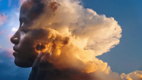 Getty Images Head with clouds