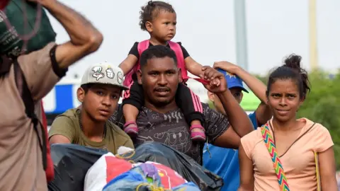 AFP People cross the Simon Bolivar International Bridge on the border between the Colombian city of Cucuta and the Venezuelan Tachira, on February 5, 2019