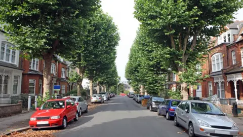 Getty Images A tree-lined street in England