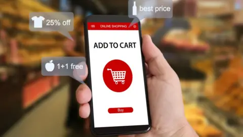 Getty Images Smartphone showing shopping basket in graphics