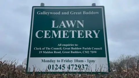 Theo Beevers/BBC A sign at the cemetery