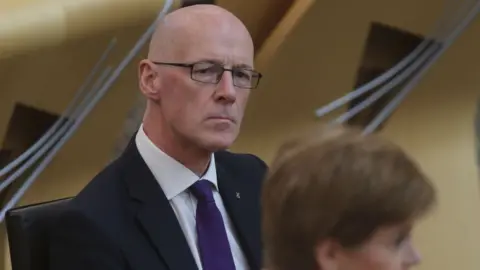 PA Media john swinney