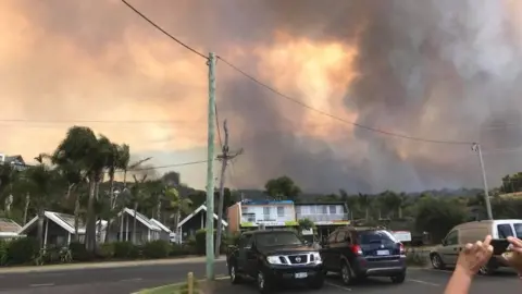 SIMONE WARD Bushfire in the town of Tathra