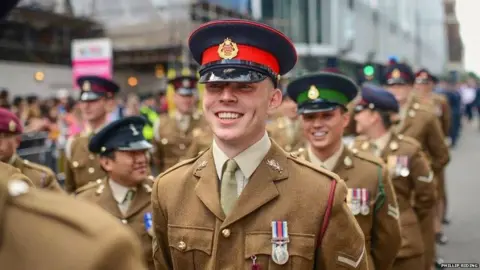 Phillip Riding  Riding marching at Pride in 2015