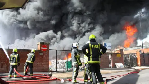 Tim Ansell A large fire with smoke